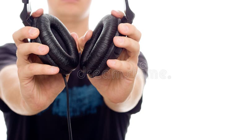 DJ giving headphones, copy space for the text. DJ giving headphones, copy space for the text
