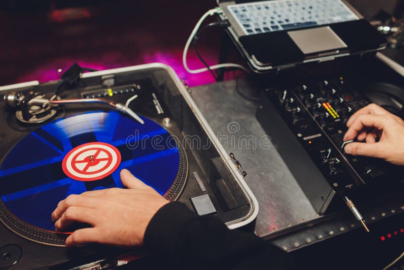 Dj Hands on Equipment Deck and Mixer with Vinyl Record at Party. Stock Photo Image of studio