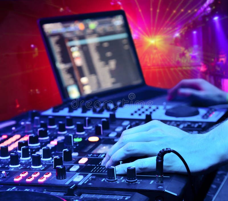 Dj mixes the track in the nightclub stock photography