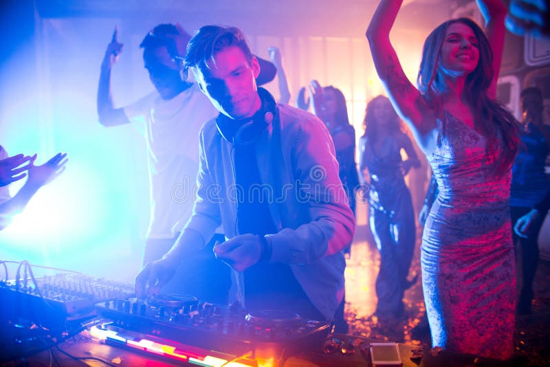 DJ Playing Music in Nightclub Stock Photo - Image of work, funky: 115619200