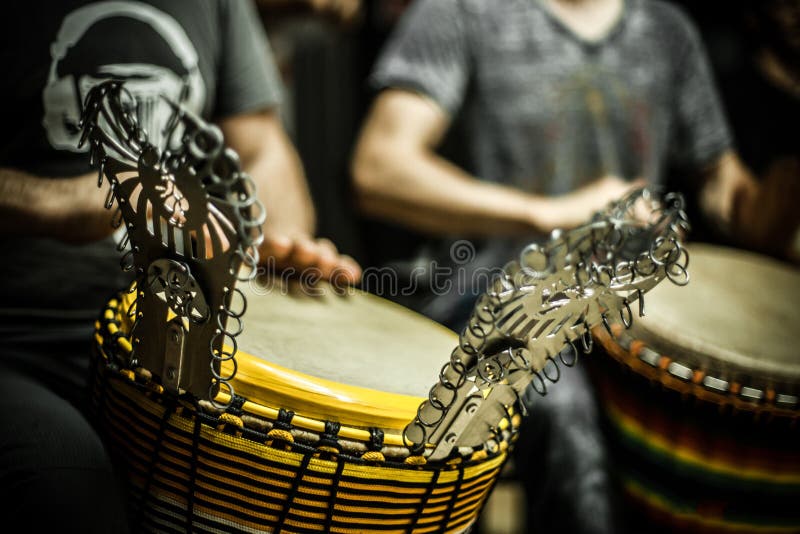 Djembe with Ksing-Ksing drum rattle royalty free stock photos