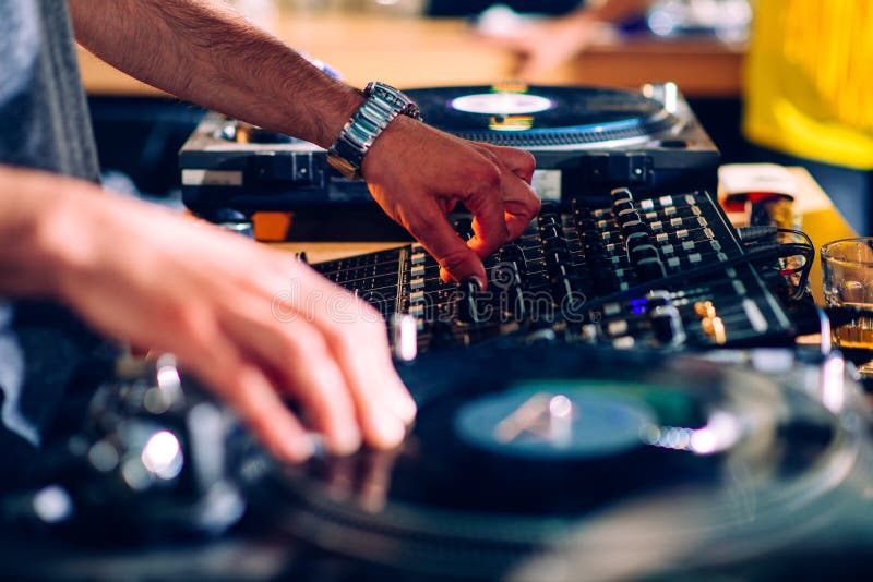DJs hands on turntable stock photo. Image of 42267154