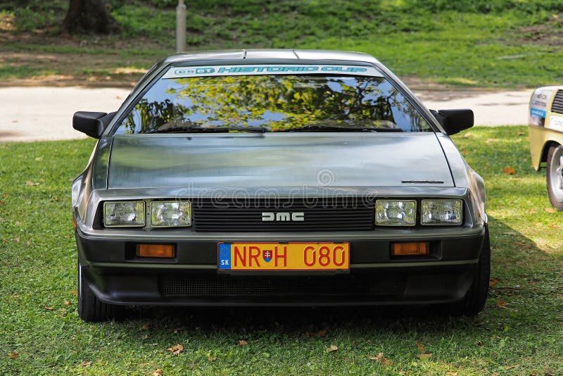 The DMC DeLorean (often referred to as the "DeLorean") is a rear-engine, two-door, two-passenger sports car manufactured and marketed by John DeLorean's DeLorean Motor Company (DMC) for the American market from 1981 to 1983â€”ultimately the only car brought to market by the fledgling company. Designed by Giorgetto Giugiaro and noted for its gull-wing doors and brushed stainless-steel outer body panels, the sports car was also noted for a lack of power and performance incongruous with its looks and price. Though its production was short-lived, the car became widely known when featured as the time machine in the Back to the Future media franchise. The DMC DeLorean (often referred to as the "DeLorean") is a rear-engine, two-door, two-passenger sports car manufactured and marketed by John DeLorean's DeLorean Motor Company (DMC) for the American market from 1981 to 1983â€”ultimately the only car brought to market by the fledgling company. Designed by Giorgetto Giugiaro and noted for its gull-wing doors and brushed stainless-steel outer body panels, the sports car was also noted for a lack of power and performance incongruous with its looks and price. Though its production was short-lived, the car became widely known when featured as the time machine in the Back to the Future media franchise.