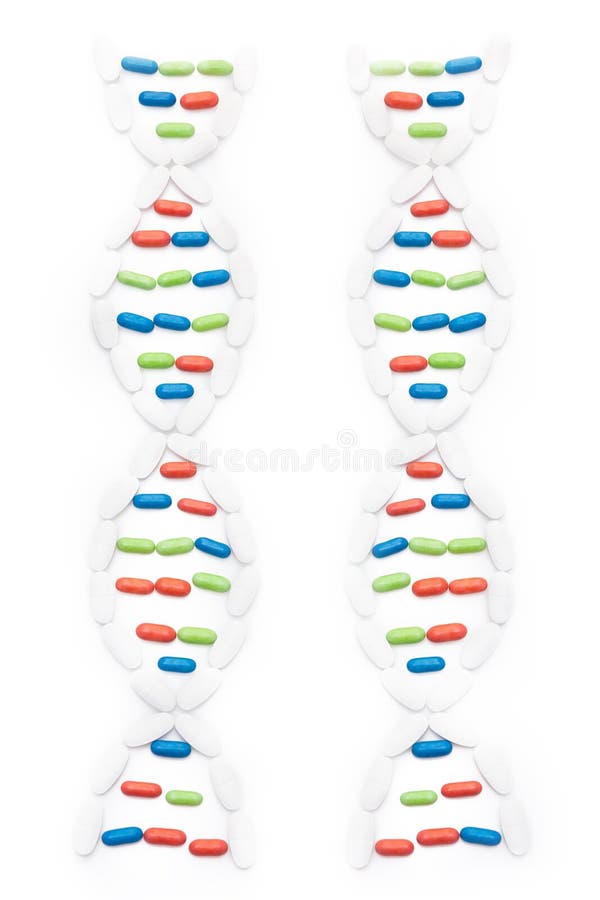 DNA shaped form made of pills and tablets of different colors. DNA shaped form made of pills and tablets of different colors