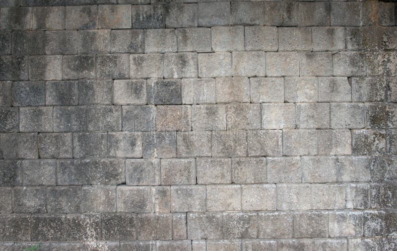 Do fundo cinzento de pedra da parede do tijolo textura áspera foto de stock Do fundo cinzento de pedra da parede do tijolo textura áspera foto de stock
