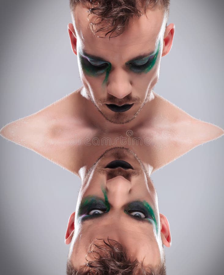 Do góry nogami podwójny przypadkowy mężczyzna z makeup zdjęcie royalty free Do góry nogami podwójny przypadkowy mężczyzna z makeup zdjęcie royalty free