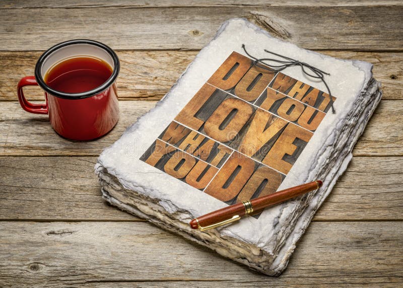 Do what you love, love what you do - motivational word abstract - wood type lettering in a handmade sketchbook with a mug of tea, happiness, career and lifestyle concept. Do what you love, love what you do - motivational word abstract - wood type lettering in a handmade sketchbook with a mug of tea, happiness, career and lifestyle concept
