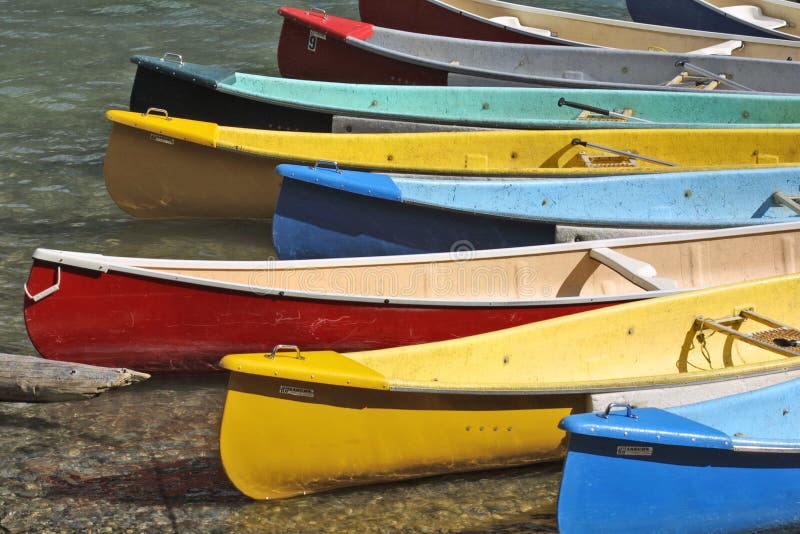 Canoes docking in Lake Morane Alberta Canada. Canoes docking in Lake Morane Alberta Canada