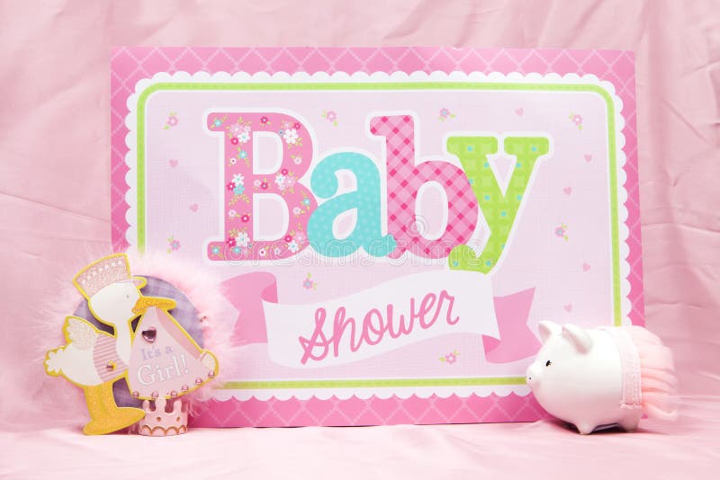 A pink baby shower sign to celebrate the upcoming birth. A pink baby shower sign to celebrate the upcoming birth