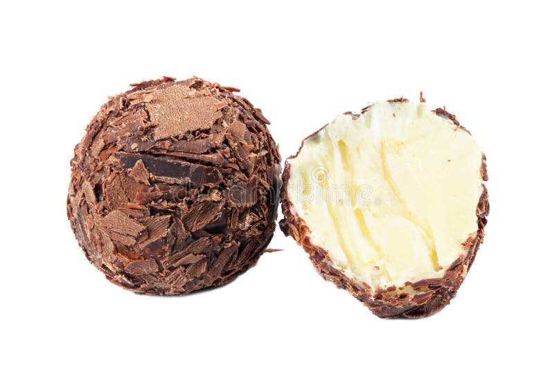 Doces de chocolate escuros com enchimento de creme imagens de stock royalty free Doces de chocolate escuros com enchimento de creme imagens de stock royalty free