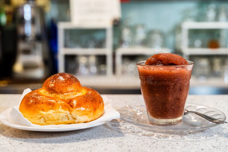 Typical Sicilian and Messina fruit granita with brioche. Typical Sicilian and Messina fruit granita with brioche