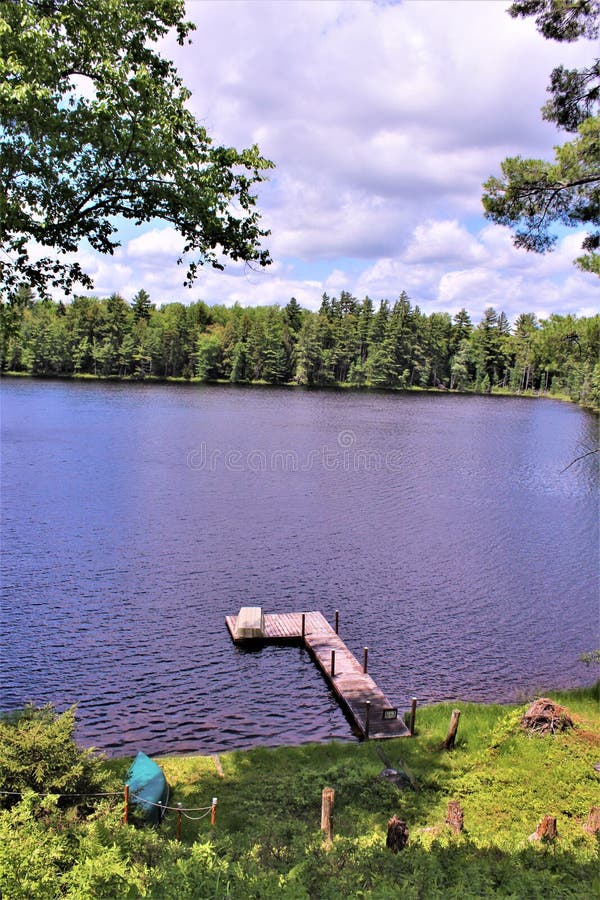 Dock at Leonard Pond located in Childwold, New York, United States