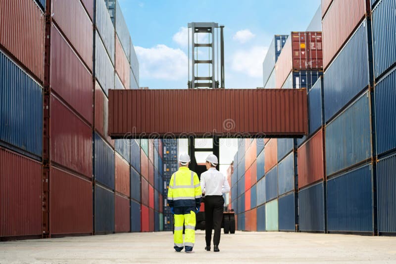 Dock Manager and Engineer Worker Discuss on Quality at Container Shipping Yard during Truck