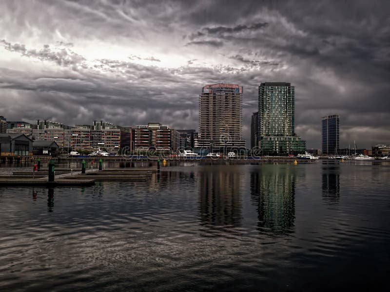 Docklands was once Melbourne’s largest and busiest port, but by the late 1980s it had become a derelict industrial wasteland. Before the foundation of Melbourne, Docklands was a wetlands area consisting of a large salt lake and a giant swamp known as West Melbourne Swamp at the mouth of the Moonee Ponds Creek. It was one of the open hunting grounds of the Wurundjeri people, who created middens around the edges of the lake. At Melbourne`s foundation, John Batman set up his home on Batman`s Hill at Docklands, marking the westernmost point of the settlement. However, the rest of the area remained largely unused for decades. The advent of rail infrastructure in the late 1860s saw the City`s industry gradually expand into the area. With inner-city living becoming more popular and Melbourne’s population set to soar, the Victorian Government saw an opportunity to extend the western edge of Melbourne’s central business district and reconnect the city to its historical waterfront.