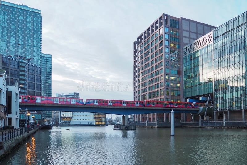 View of Docklands Light Railway DLR train at Canary Wharf business district, London, England, UK. View of Docklands Light Railway DLR train at Canary Wharf business district, London, England, UK.