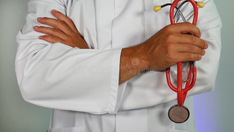 Docteur habill? dans le manteau blanc photo stock Docteur habill? dans le manteau blanc photo stock