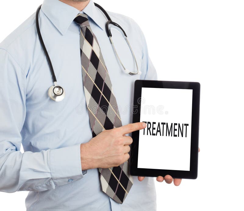 Docteur tenant le comprimé - traitement photographie stock libre de droits Docteur tenant le comprimé - traitement photographie stock libre de droits