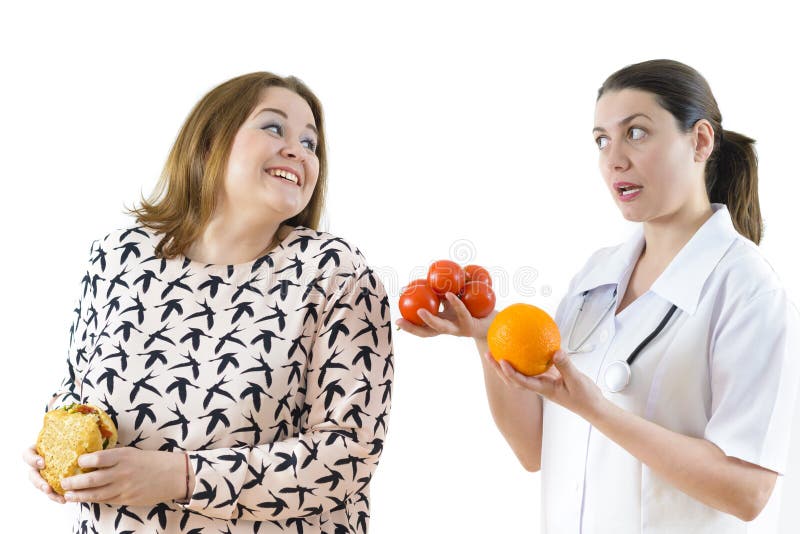 Doctor Advising a Corpulent Woman to Eat Healthy royalty free stock photos Doctor Advising a Corpulent Woman to Eat Healthy royalty free stock photos