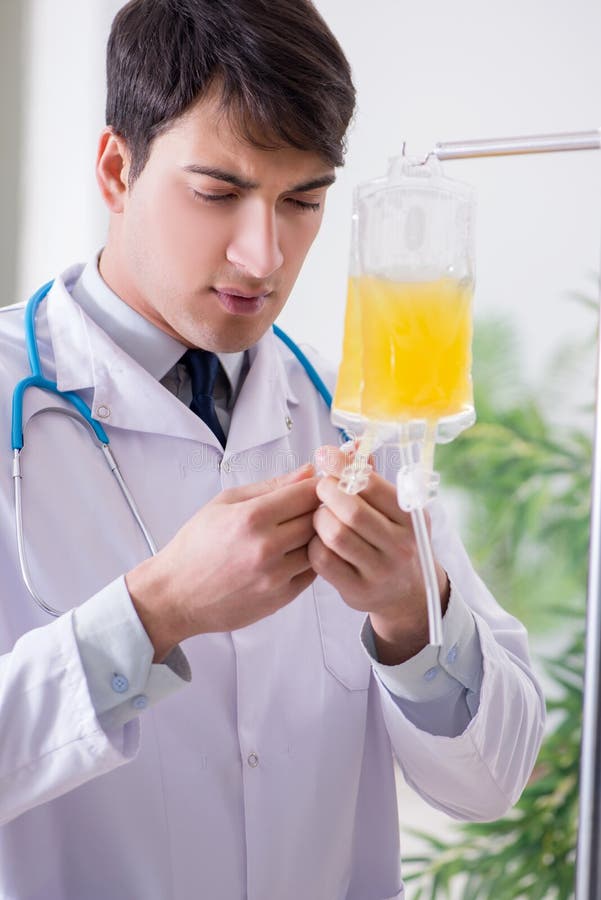 The Doctor with Bag of Blood Plasma in Hospital Stock Image Image of