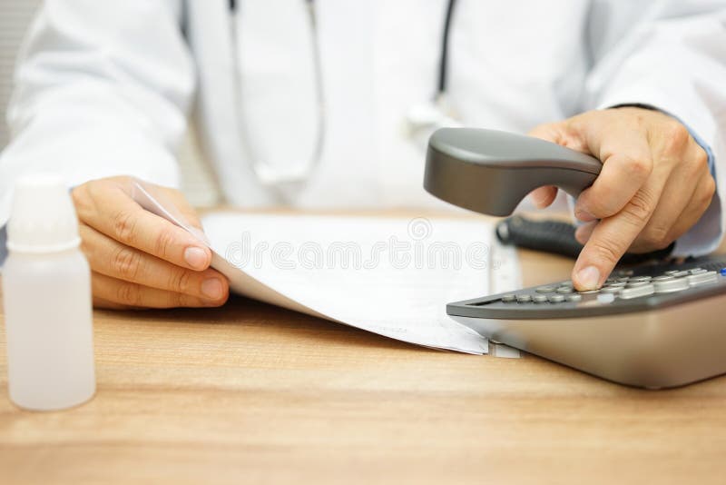 Doctor is calling patient after reading diagnose