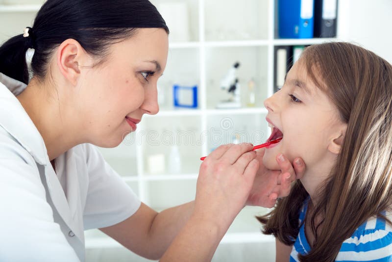 Doctor Check Throat of Little Girl Stock Image Image of medicine