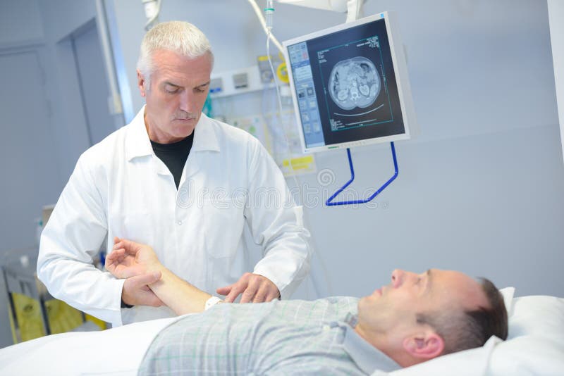 Doctor checking arm stock image. Image of doctor, internal 250115307