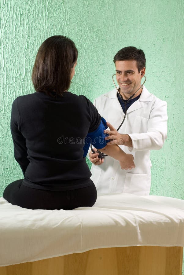 Doctor Checking Blood Pressure - vertical