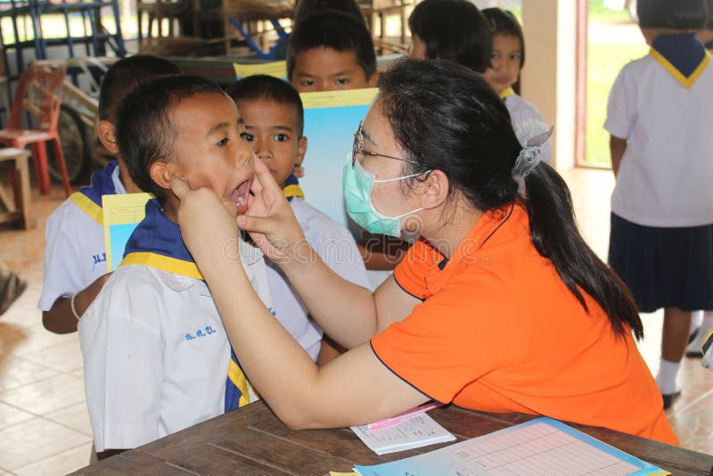 Doctor Is Checking The Oral Cavity Of A Student Editorial Stock Photo