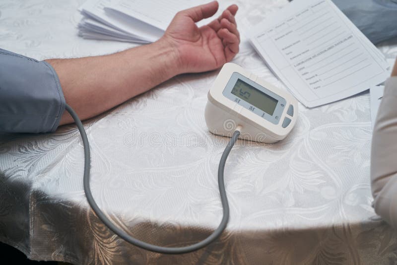 Doctor Checking Patient Arterial Blood Pressure Close Up Stock Image