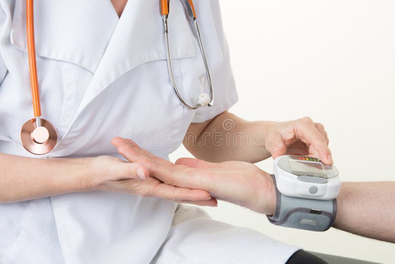 Doctor checking patient arterial blood pressure in hospital in digital monitor Health care Concept stock images Doctor checking patient arterial blood pressure in hospital in digital monitor Health care Concept stock images