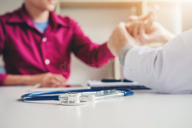 Doctor checking pulse for Heart rate patients Health care in hospital stock photos Doctor checking pulse for Heart rate patients Health care in hospital stock photos
