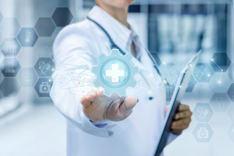 Doctor clicks on medical equipment icon. stock photo