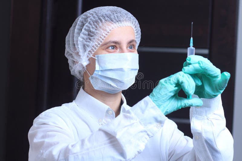 Doctor con la vacuna anti de la gripe Trabajador médico fotos de archivo Doctor con la vacuna anti de la gripe Trabajador médico fotos de archivo