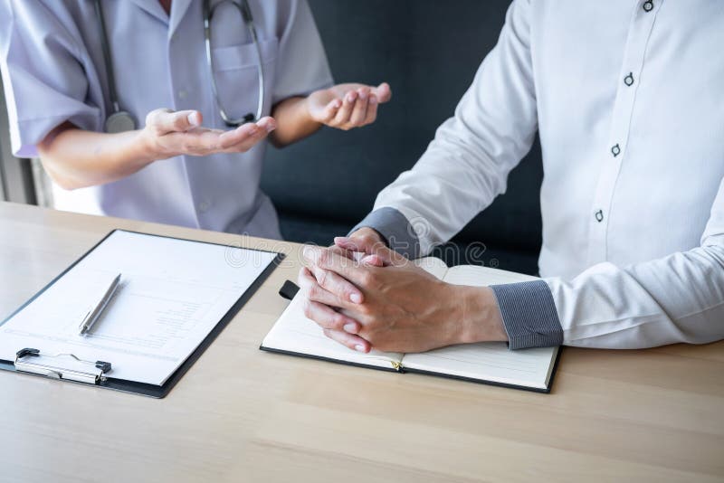 Doctor Consulting with Patient Examining for Patient, Presenting