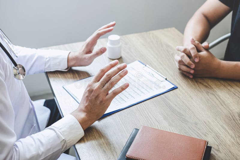 Doctor Consulting with Patient Examining for Patient, Presenting