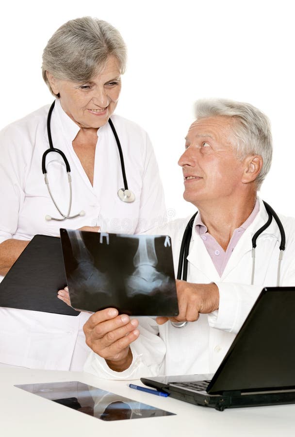 Doctor couple working at table