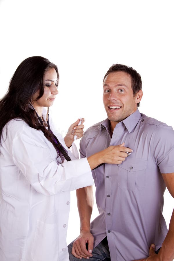Doctor de la mujer con el paciente masculino imágenes de archivo libres de regalías Doctor de la mujer con el paciente masculino imágenes de archivo libres de regalías
