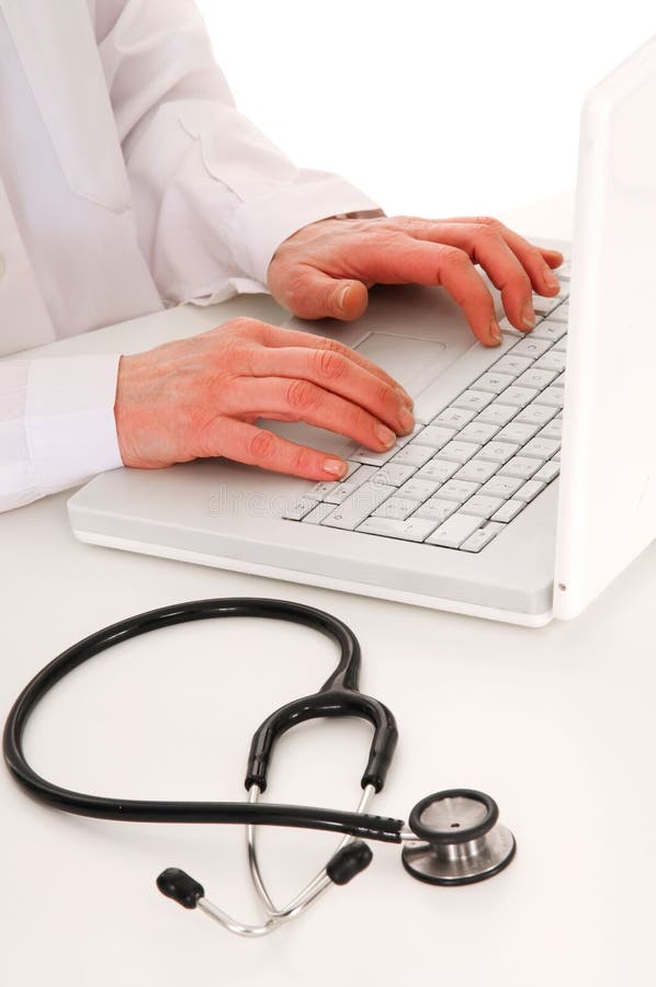 Doctor at the desk with stethoscope