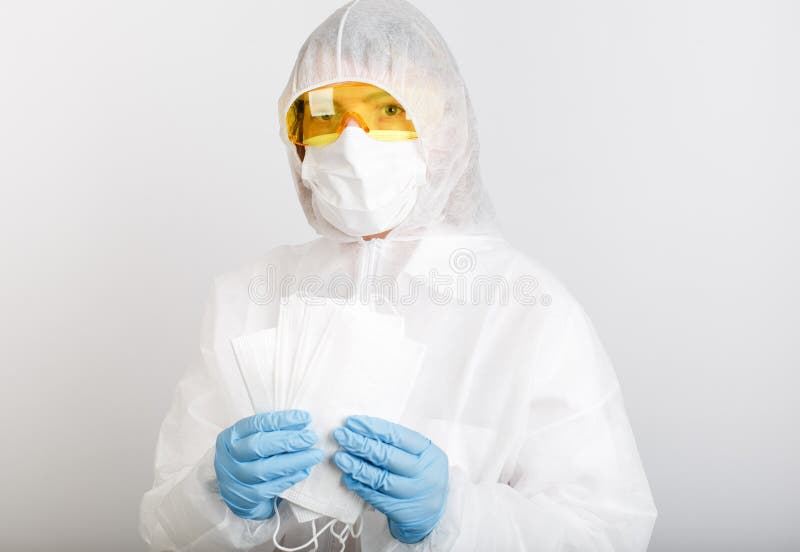 Doctor in Anti-epidemic Suit Holds Medical Masks To Protect Against ...