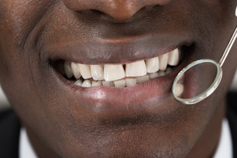 Doctor Doing Dental Check Up Of Patient royalty free stock photos Doctor Doing Dental Check Up Of Patient royalty free stock photos
