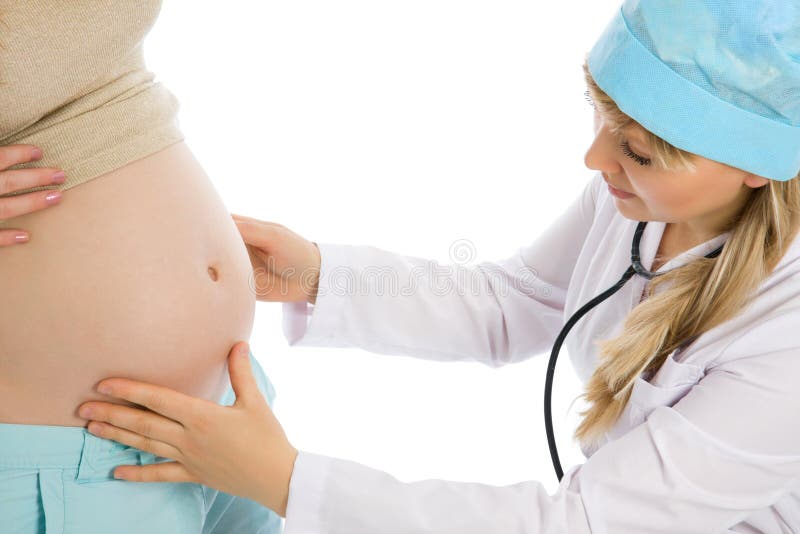 Doctor examines pregnant female