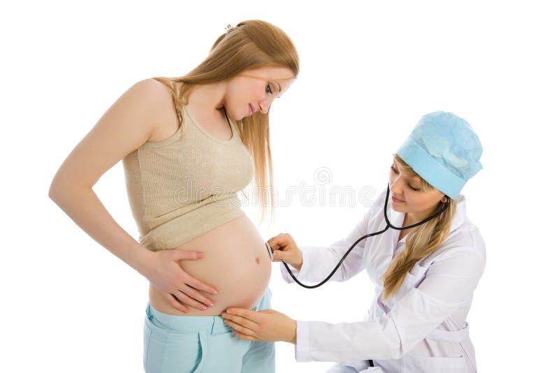 Doctor examines pregnant female using stethoscope