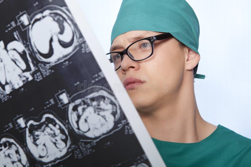 Doctor examines X-ray human brain