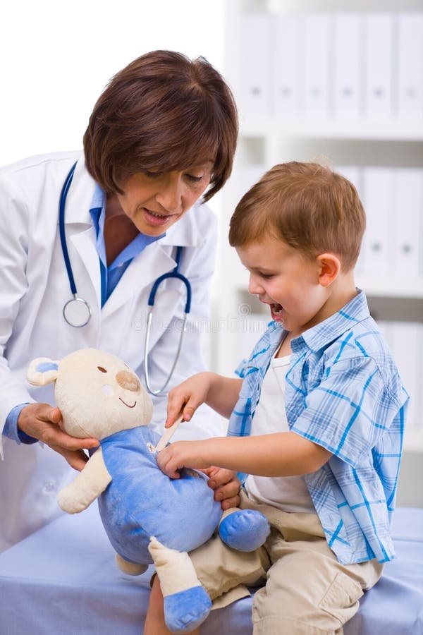 Doctor examining child royalty free stock photo