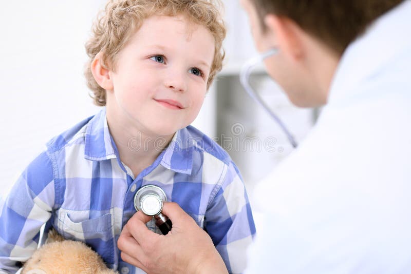 Doctor Examining a Child Patient by Stethoscope Stock Photo Image of