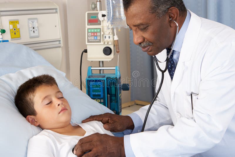 Doctor And Nurses Treating Critical Patient Stock Photo 