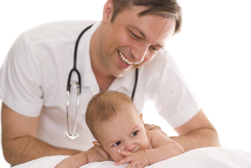 Doctor examining newborn