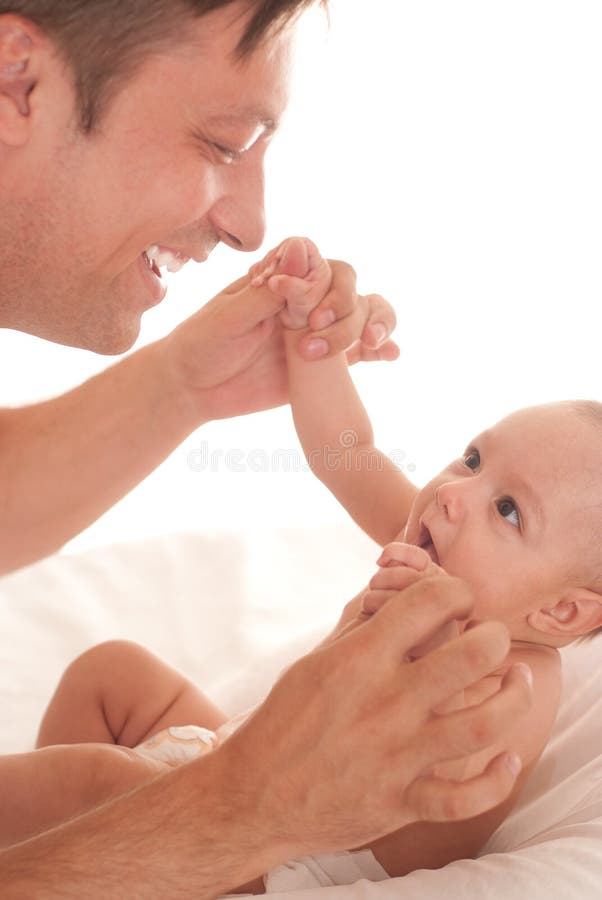 Doctor examining newborn