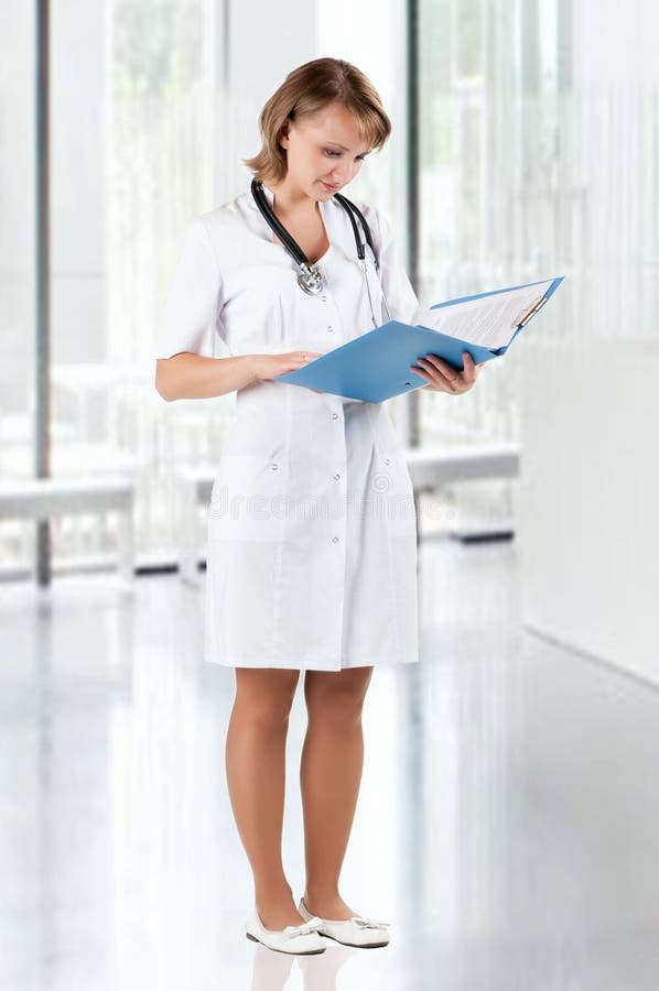 Doctor with file folder