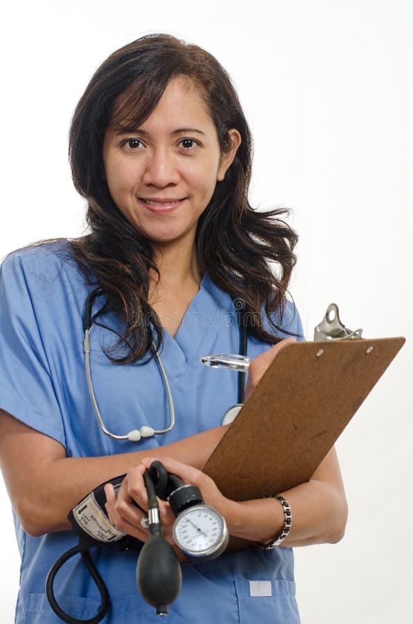 Doctor filipino asiático atractivo de la enfermera fotos de archivo